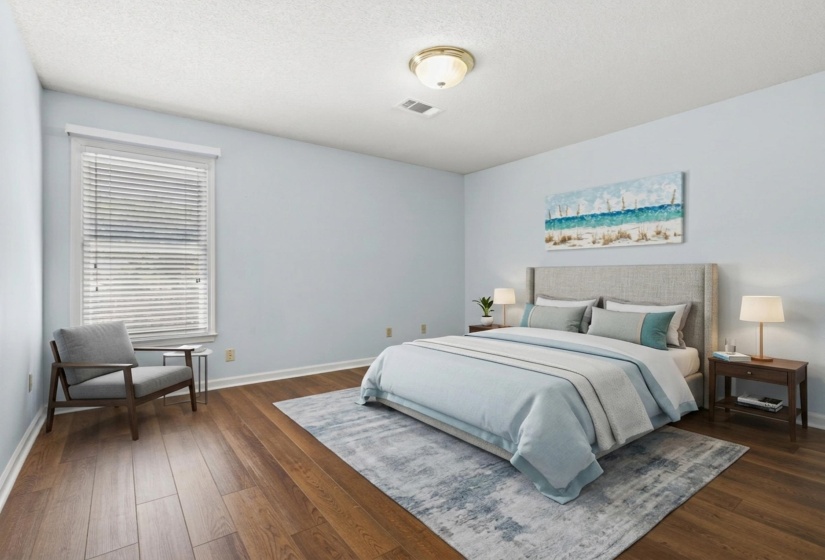 Bedroom featuring dark wood-style flooring