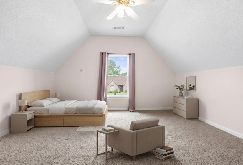 Bedroom featuring carpet floors, ceiling fan, and a textured ceiling
