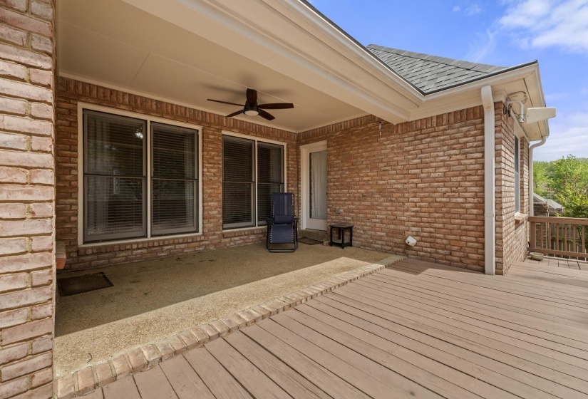 Deck with a patio area and a ceiling fan