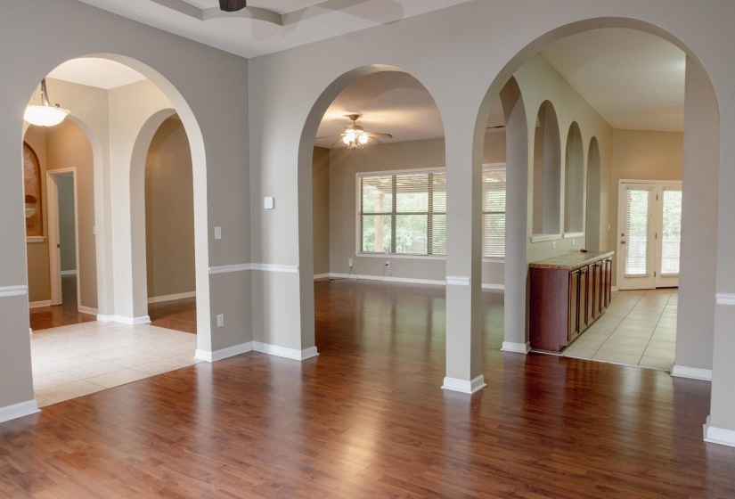 Unfurnished room featuring ceiling fan and light wood-style floors