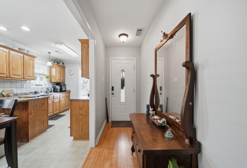 Foyer entrance with baseboards