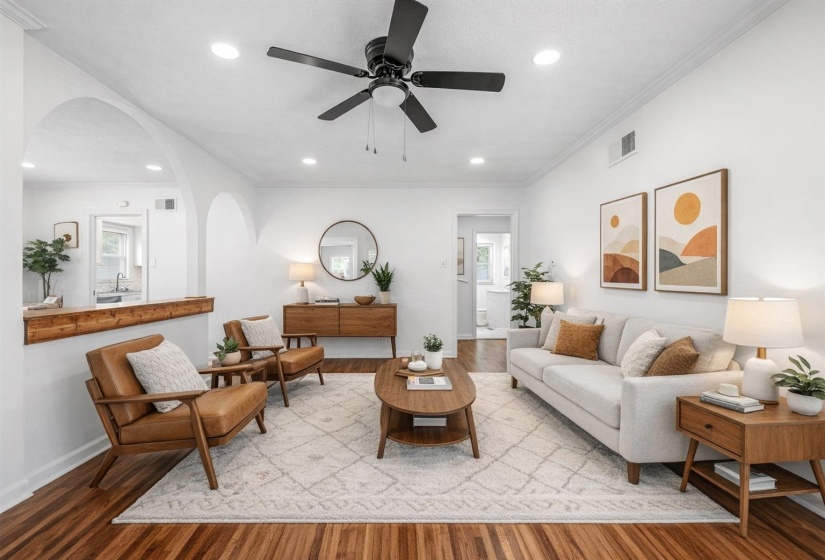 Living area featuring ceiling fan, light wood finished floors, ornamental molding, and recessed lighting