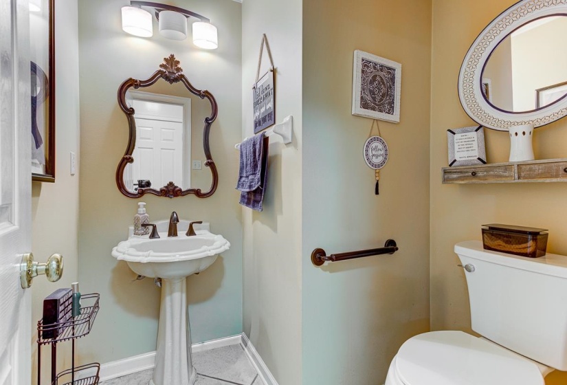Bathroom featuring baseboards and toilet