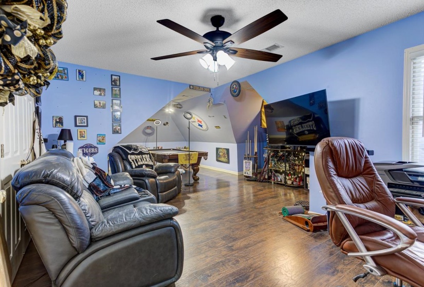Office featuring dark wood-style flooring, a textured ceiling, billiards, and ceiling fan