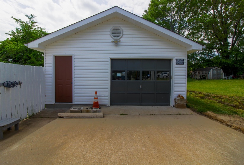 Detached garage with driveway