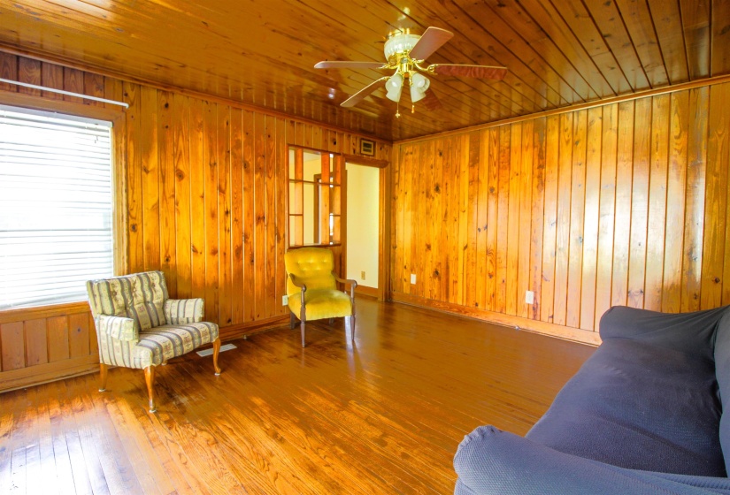Original Hardwood Floors and huge front window.