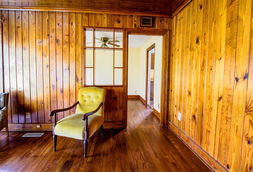 Original Hardwood Floors and huge front window.