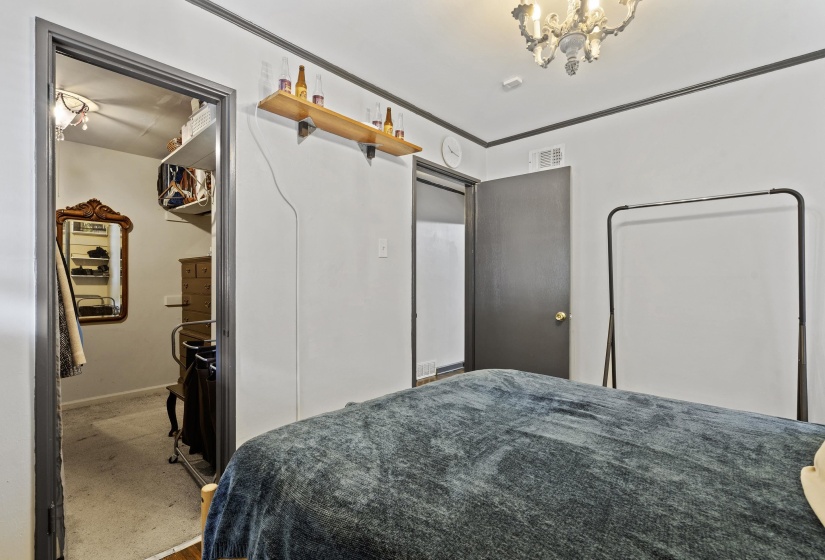 Bedroom with carpet and baseboards