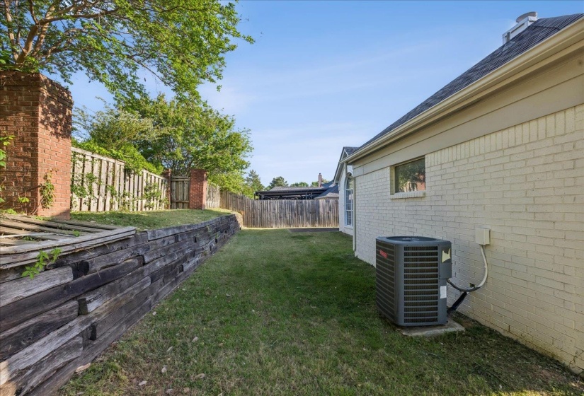 View of fenced backyard