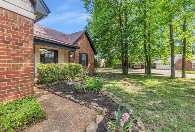 View of yard featuring covered porch