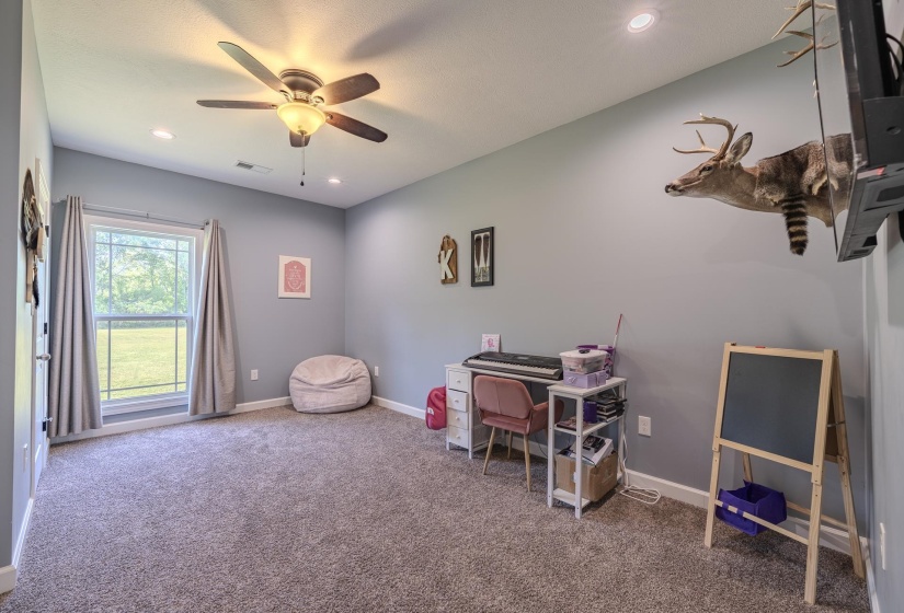 featuring recessed lighting, carpet floors, and ceiling fan