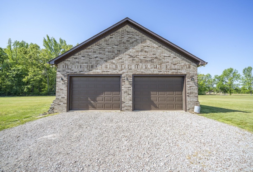 Garage featuring driveway