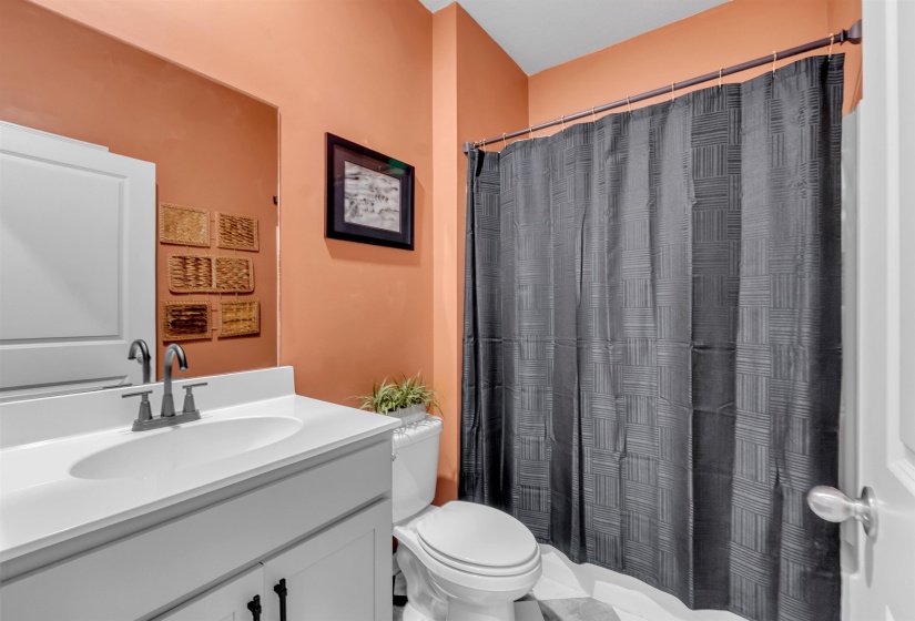 Bathroom with vanity and a shower with curtain