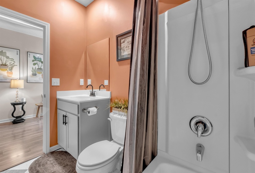 Full bathroom with vanity and shower / bath combo