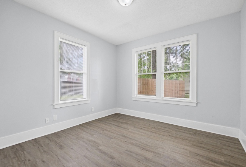 Empty room featuring wood finished floors
