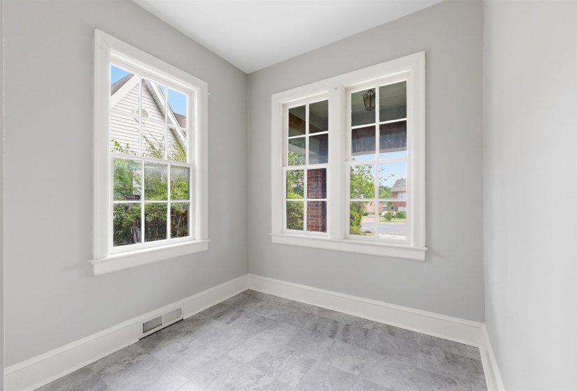 Empty room featuring baseboards