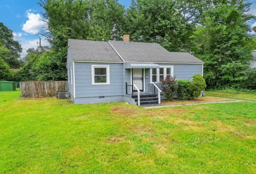 Bungalow featuring crawl space, a chimney, and a shingled roof