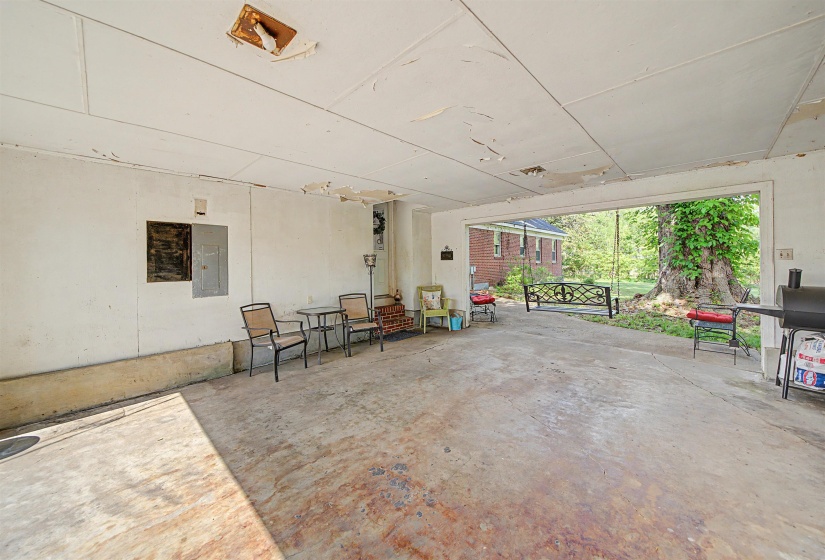 View of patio / terrace featuring electric panel and area for grilling