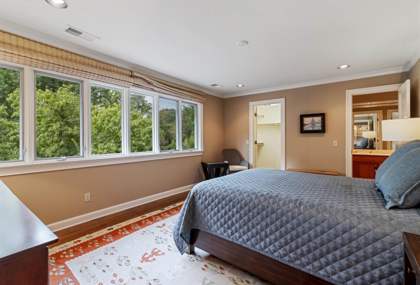 Features Hardwood and a Walk-In Closet  Plus Access to a Shared Bath