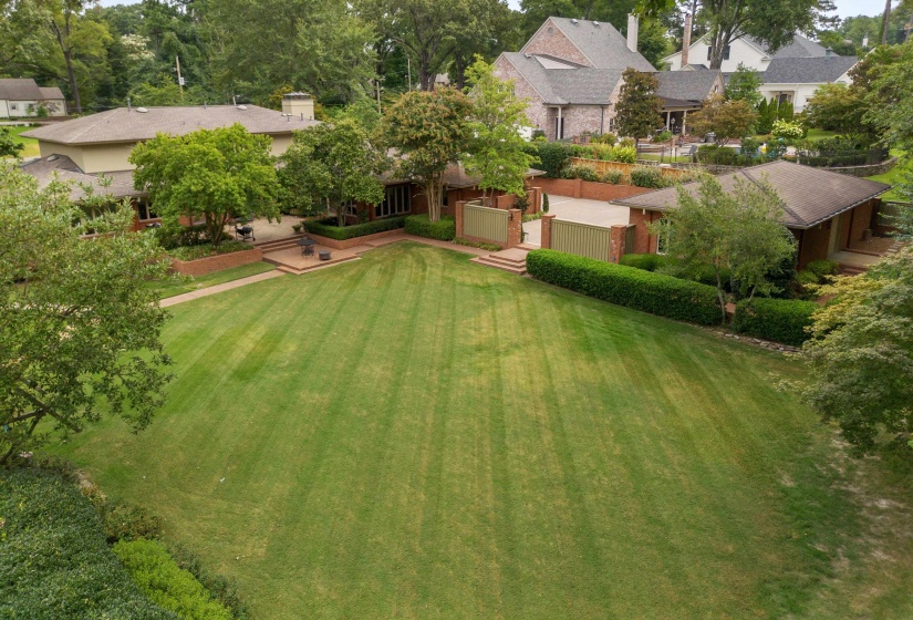 RARE ONE-ACRE RETREAT FRAMED BY NATURE AND CRAFTED FOR SERENITY - Beautifully Landscaped Backyard Features Mature Shade Trees, Patios, etc.   Perfect for Outdoor Enjoyment and Entertaining.