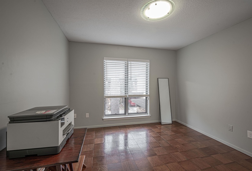 Empty room featuring a textured ceiling
