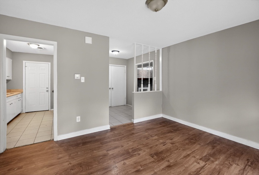 Empty room with light wood-type flooring and baseboards
