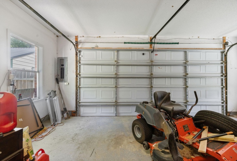 Garage featuring electric panel