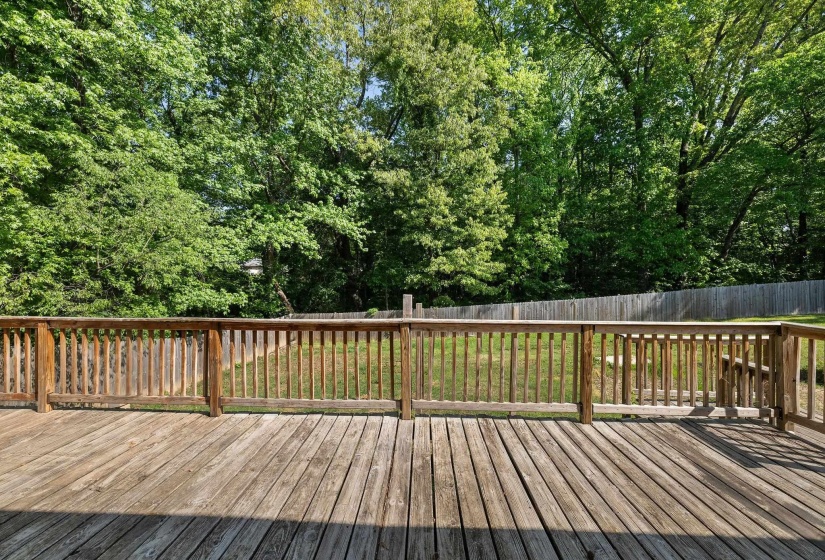 Wood-finish deck with a perimeter railing