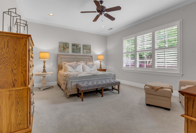 Bedroom featuring crown molding, ceiling fan, light carpet, and recessed lighting