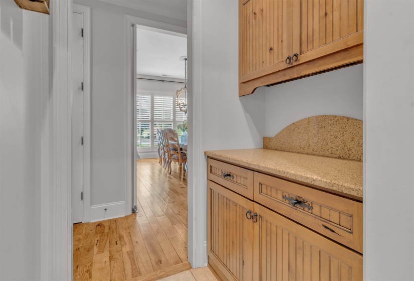 Corridor with light wood finished floors