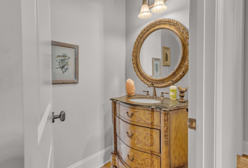 Bathroom with vanity and baseboards