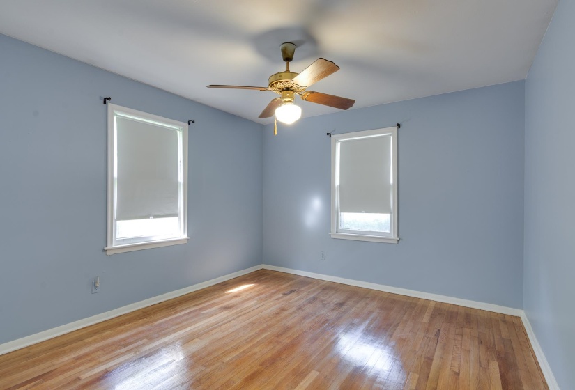 Hardwood flooring featuring a natural finish