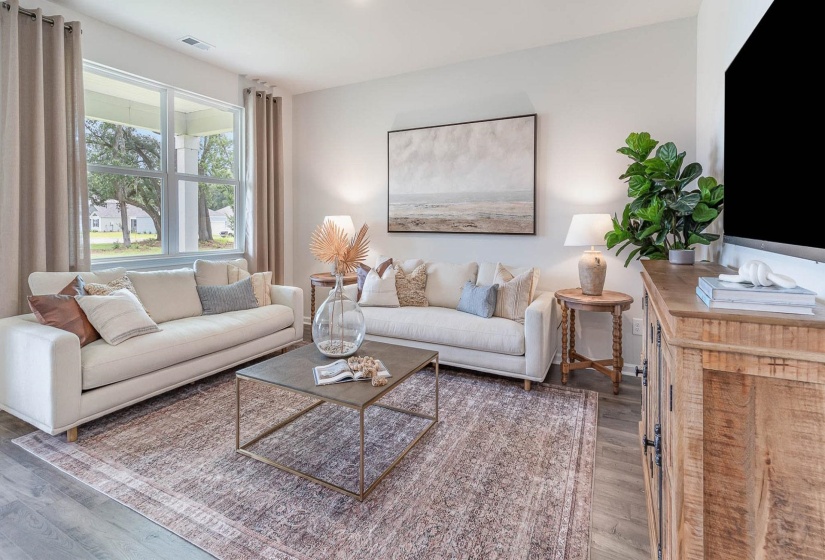 Living area with wood finished floors
