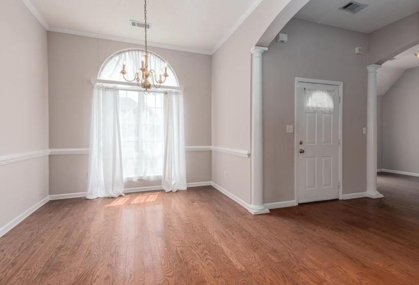 Hardwood-style flooring throughout