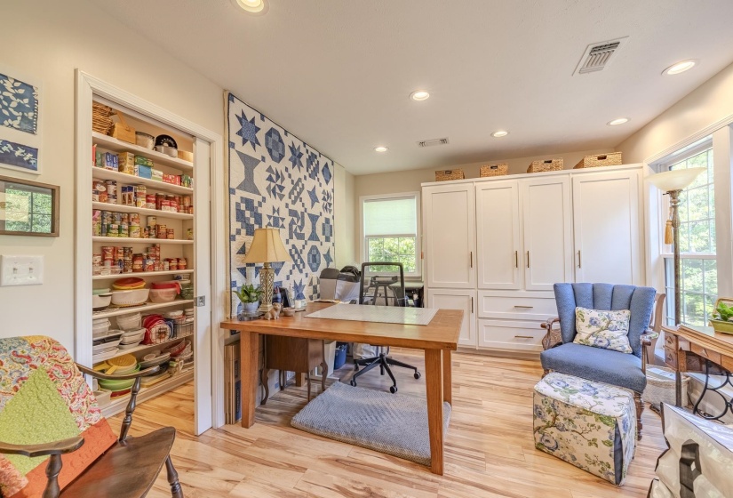 Room featuring wood-finish flooring and recessed lighting