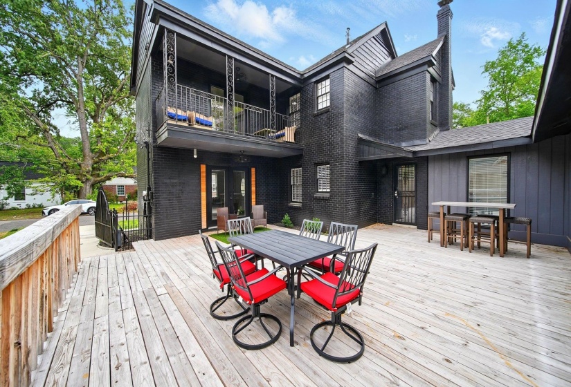 Wooden terrace featuring outdoor dining space