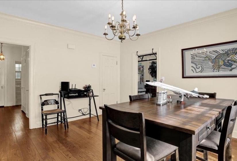 This spacious formal dining area features hardwood flooring, plenty of natural light that adds to the open and spacious feeling of this home.