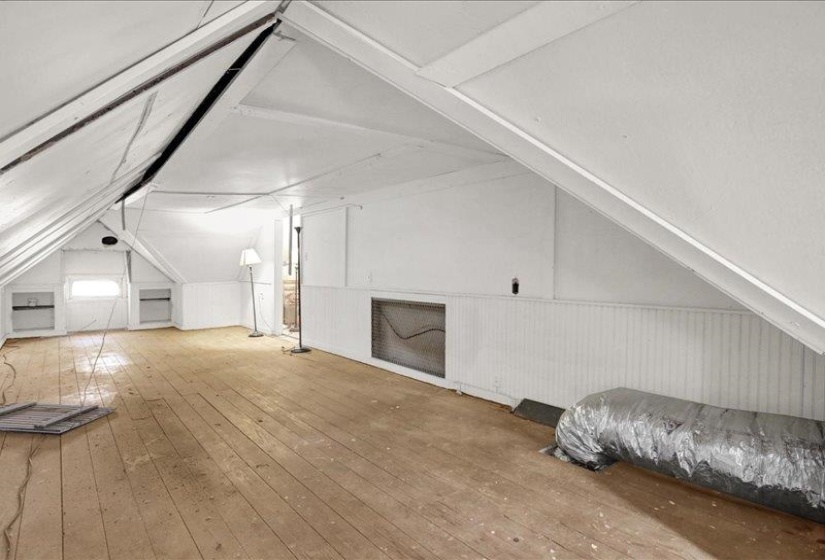 Spacious, walk up attic area can give you more space.