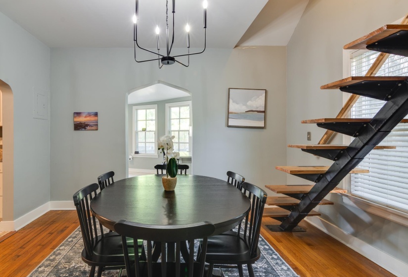 Open-tread staircase with metal stringers and wood steps