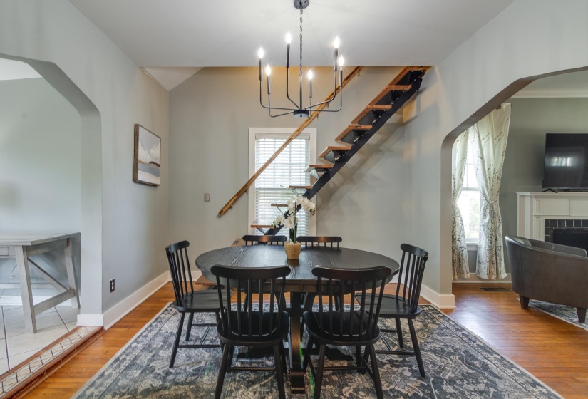 Open-tread staircase with wood risers and black metal stringers