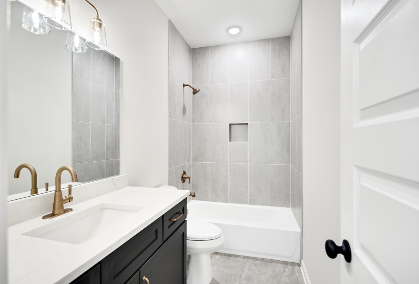Full bathroom with vanity and shower / bathtub combination
