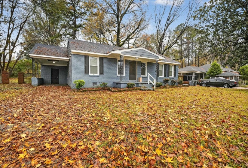 Ranch-style house with brick siding, crawl space, and covered porch