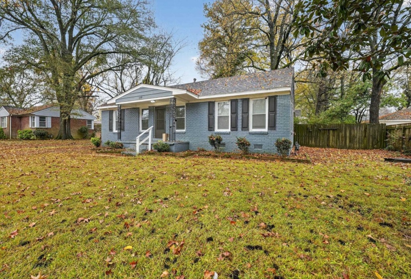Single story home featuring brick siding and crawl space