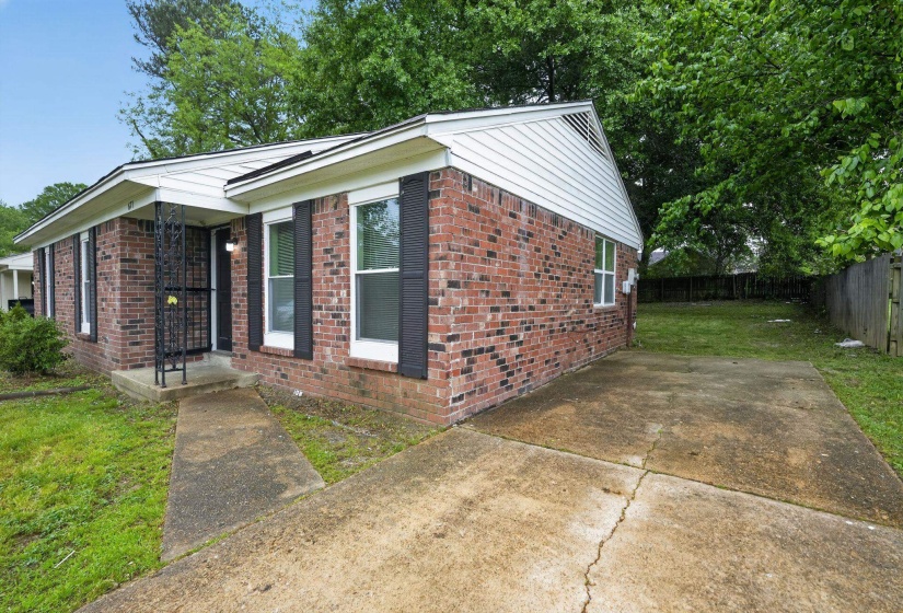 View of front of house with brick siding