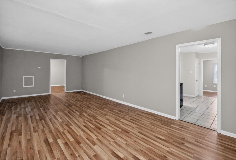 Spare room with light wood finished floors and baseboards