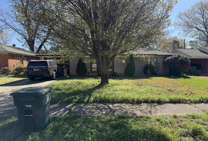 View of front of house featuring a front lawn