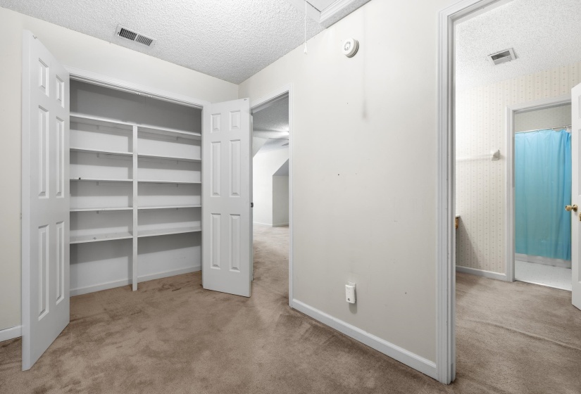 Built-in shelving with bifold doors