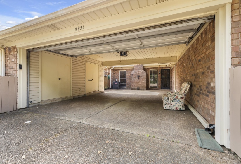 Covered carport offering overhead protection