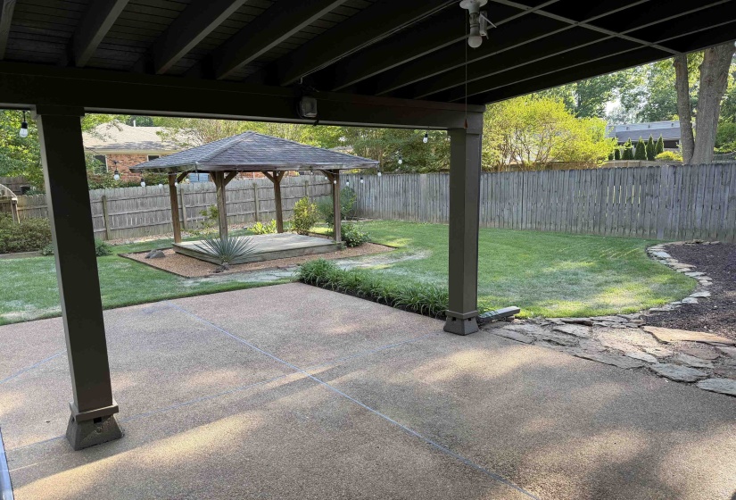 Covered patio featuring an aggregate concrete surface