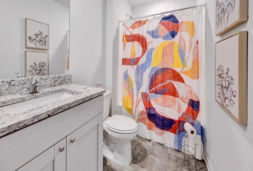 Bathroom with vanity and toilet
